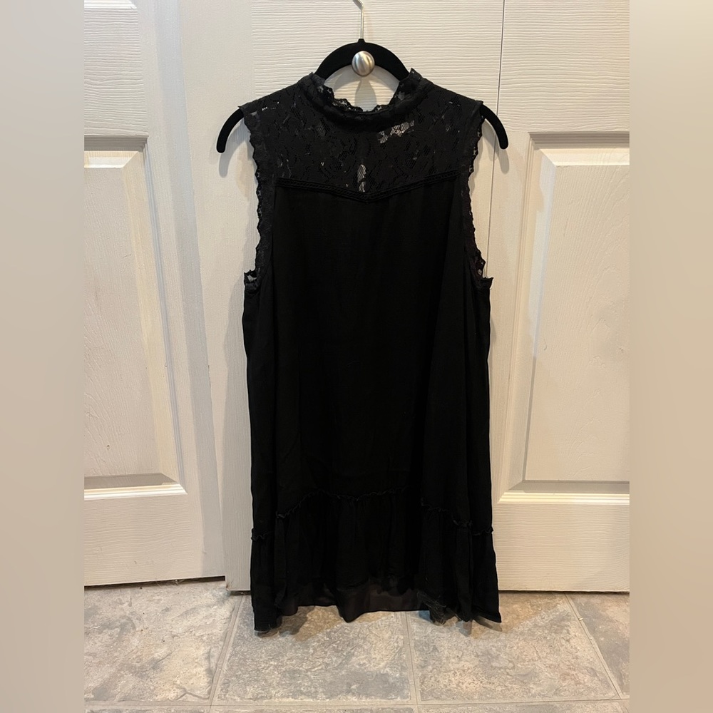 Little black baby doll dress with lace at the top